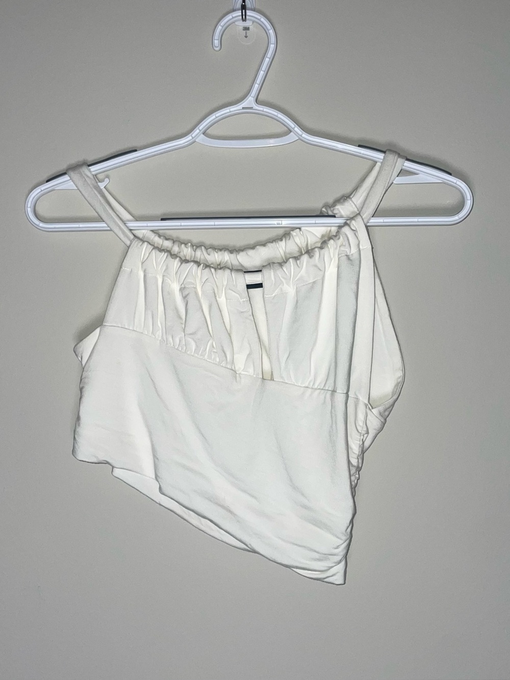 The Kript S White Asymmetrical Halter Neck Bamboo Soft Crop Top